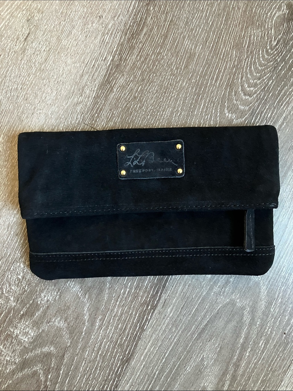 L.L. Bean black suede fold-over clutch